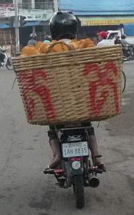 Basket of bread on a motorcycle